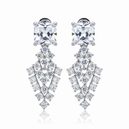 Pair of diamond earrings on a white background